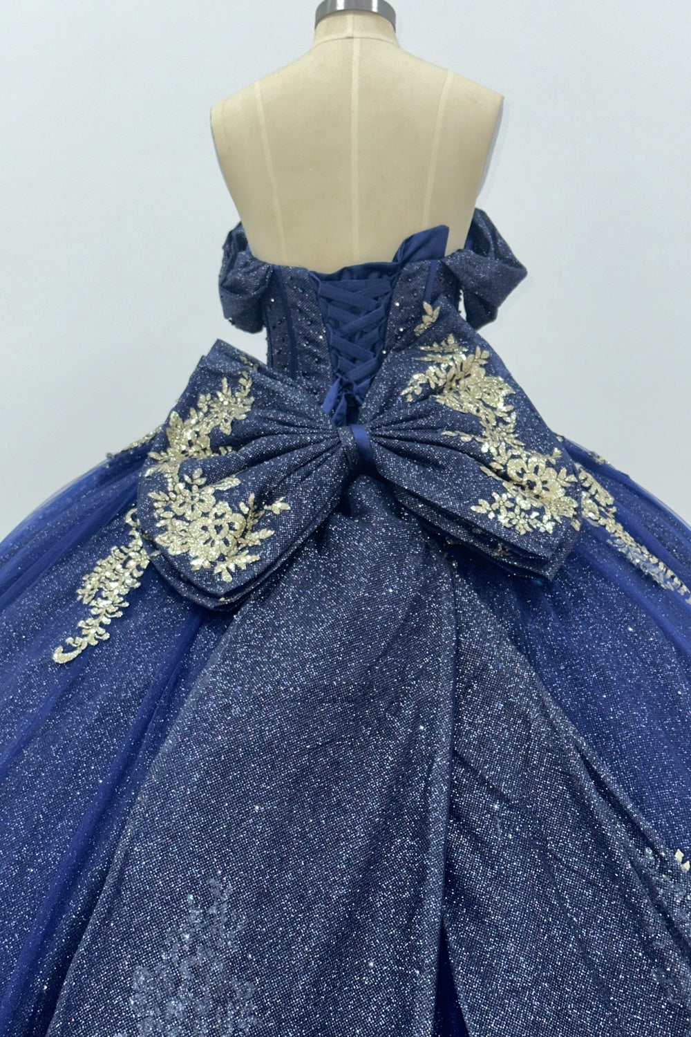 Off Shoulder Sleeveless Beaded Gold Appliques Bow Knot Glitter Navy Quinceañera Dress Y1007