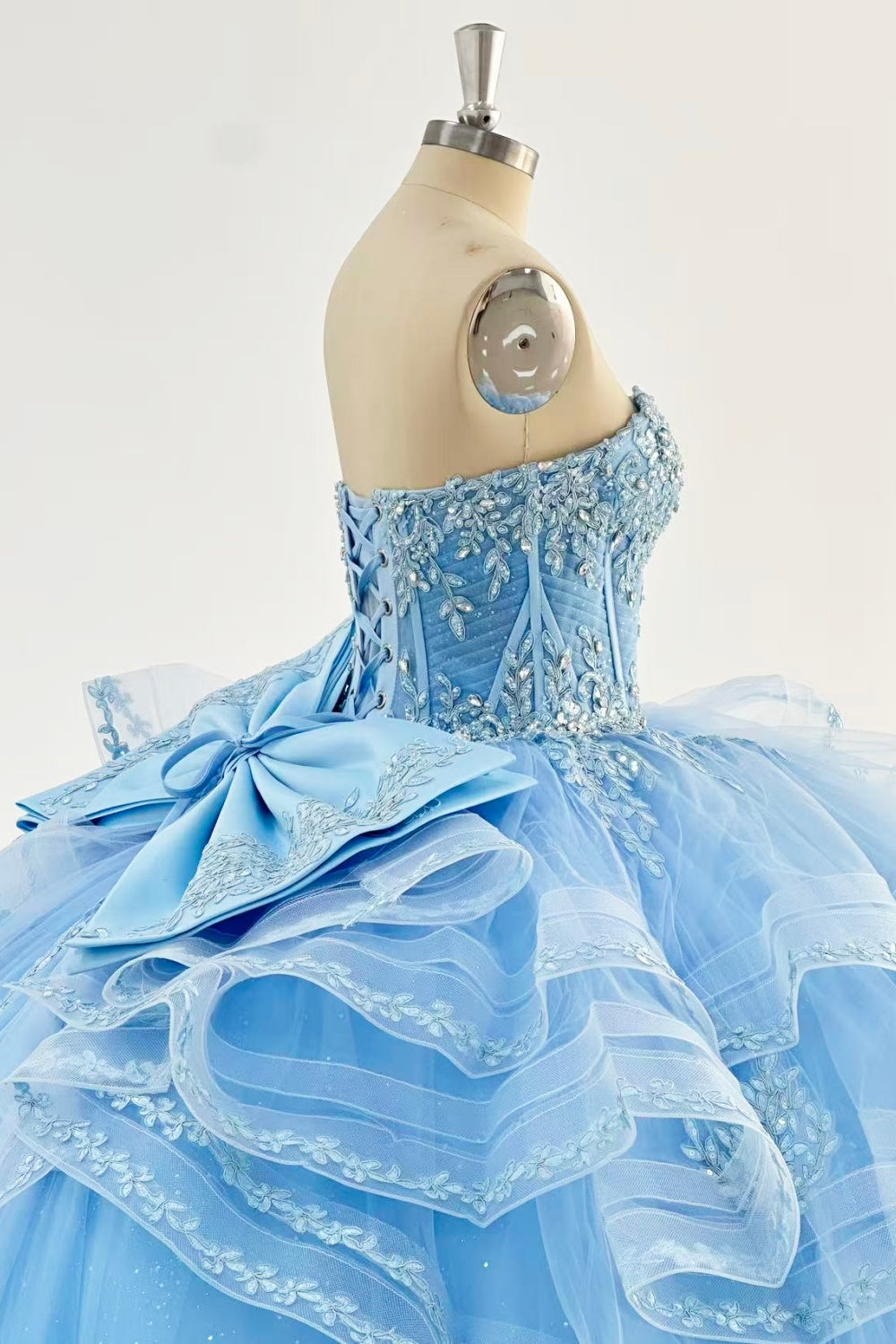 Sweetheart Sleeveless Beaded Appliques Ruffles Tiered Bow Knot Baby Blue Quinceañera Dress Y1016