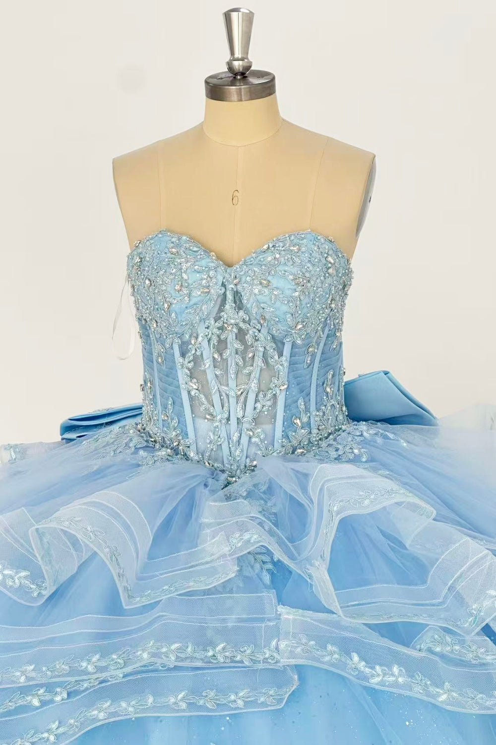 Sweetheart Sleeveless Beaded Appliques Ruffles Tiered Bow Knot Baby Blue Quinceañera Dress Y1016
