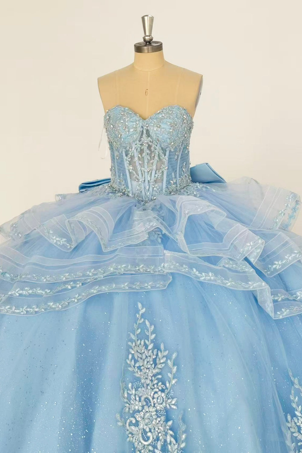 Sweetheart Sleeveless Beaded Appliques Ruffles Tiered Bow Knot Baby Blue Quinceañera Dress Y1016