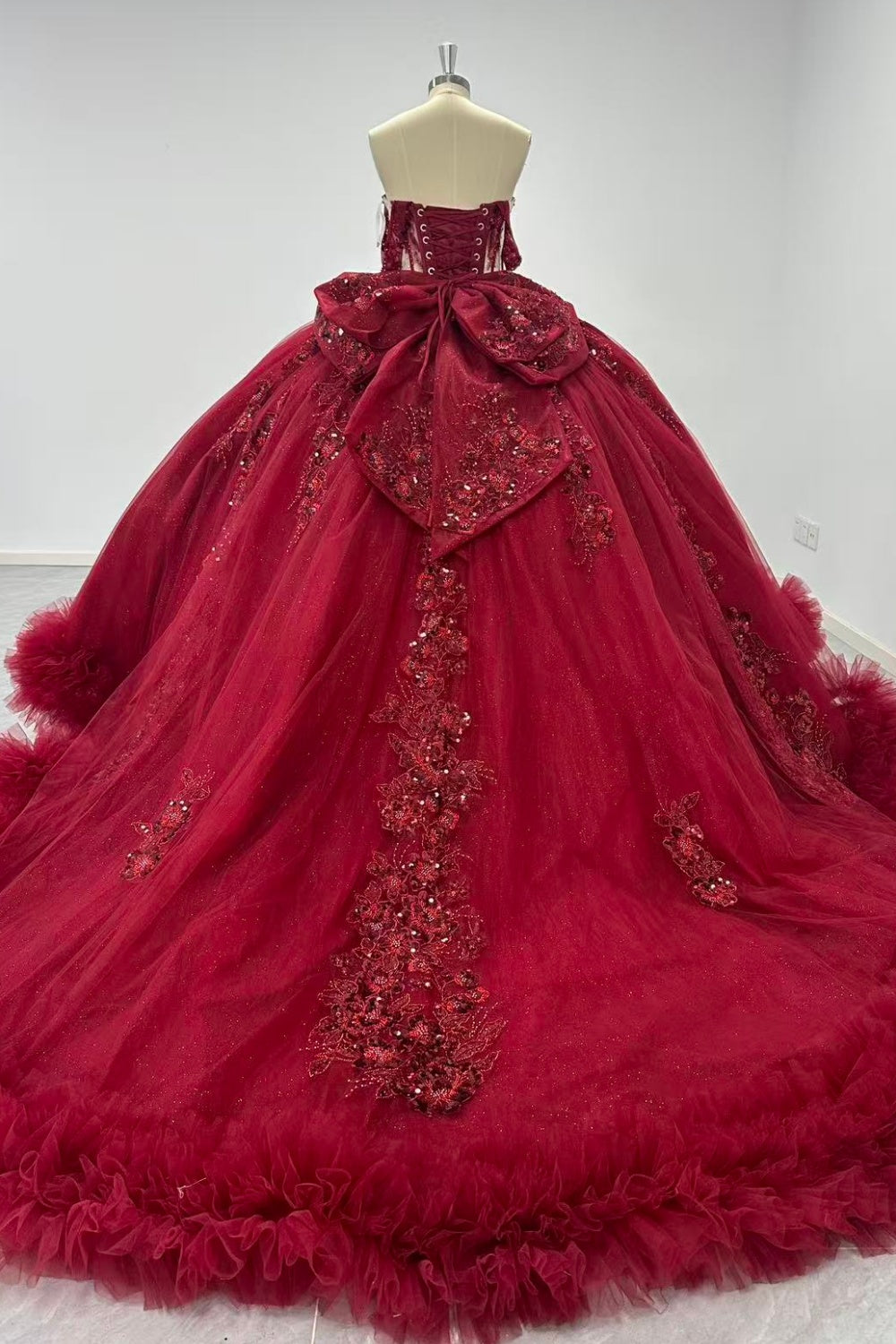 Off Shoulder Sleeveless Beaded Appliques Bow Knot Ruffles Tiered Quinceañera Dress Y1021