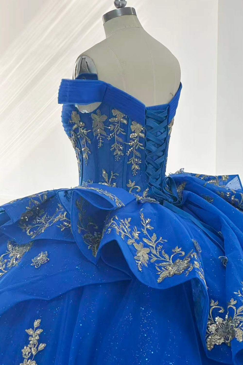 Off Shoulder Sleeveless Gold Appliques Ruffles Royal Blue Quinceañera Dress Y1024