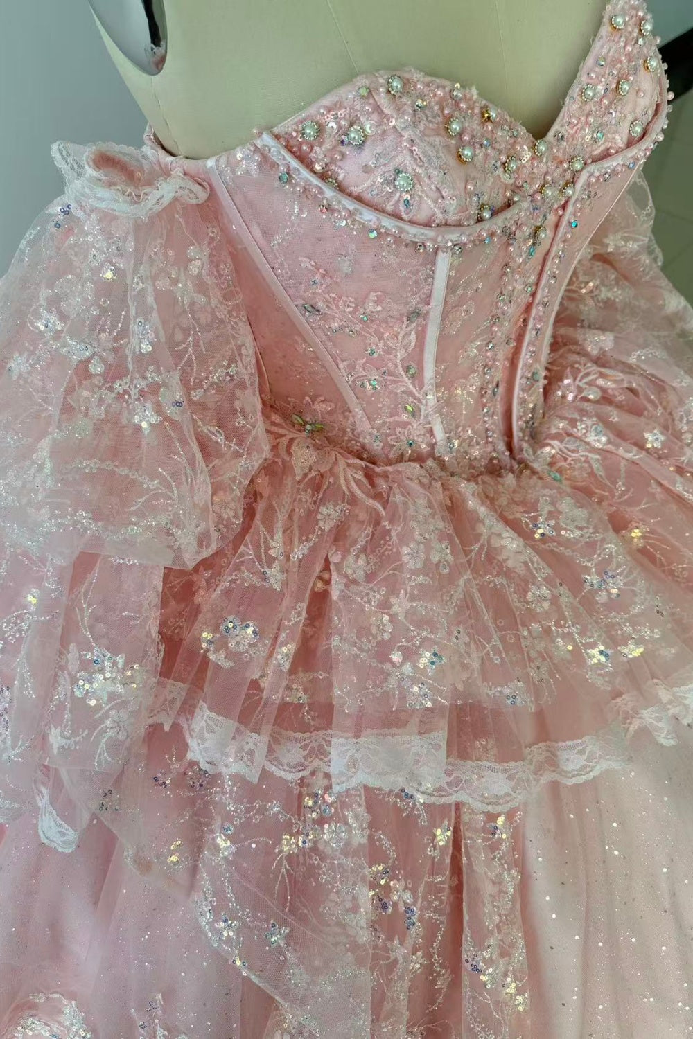 Strapless Sleeveless Ruffles Sequins Appliques Ruffles Tiered Pink Quinceañera Dress Y1027