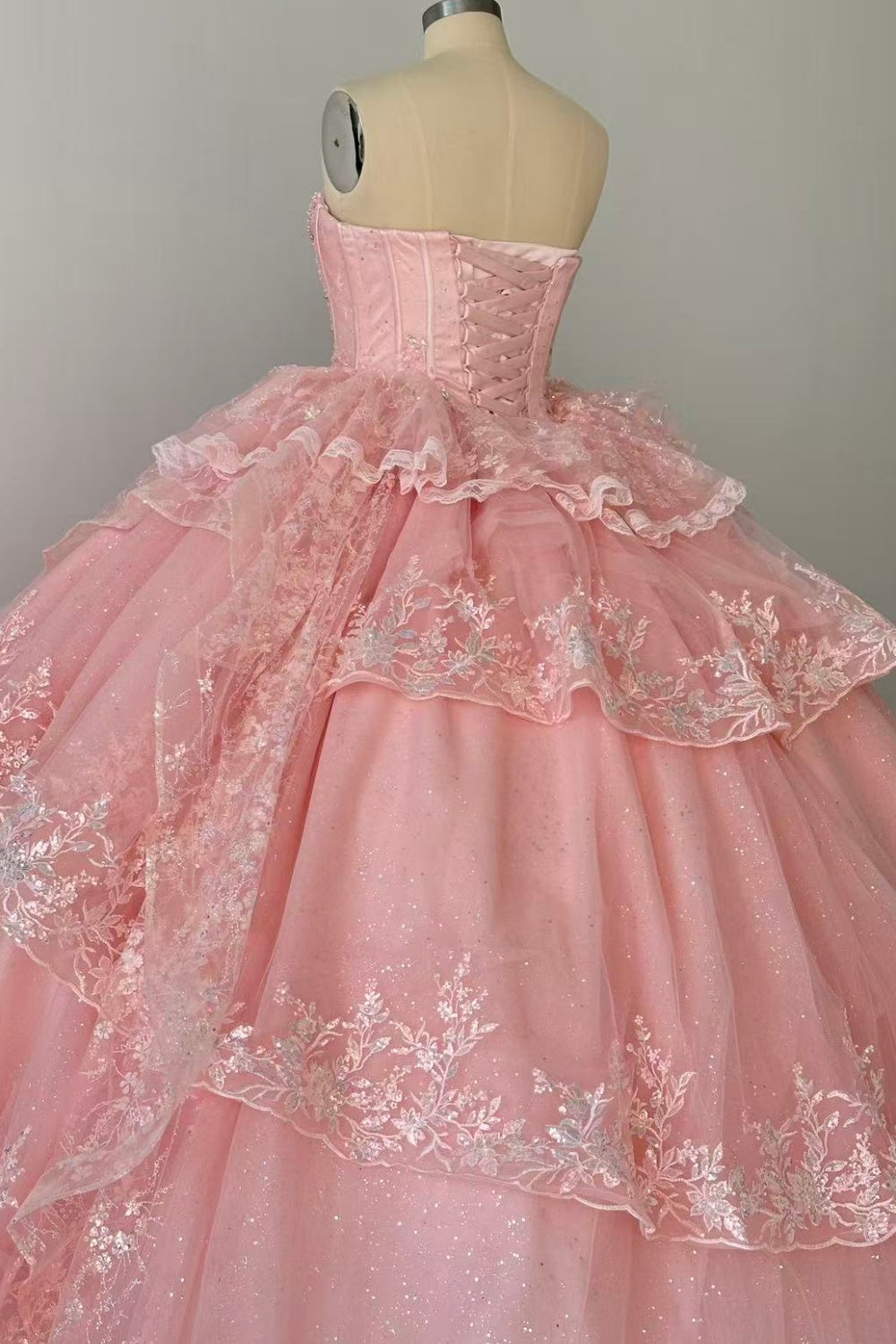 Strapless Sleeveless Ruffles Sequins Appliques Ruffles Tiered Pink Quinceañera Dress Y1027