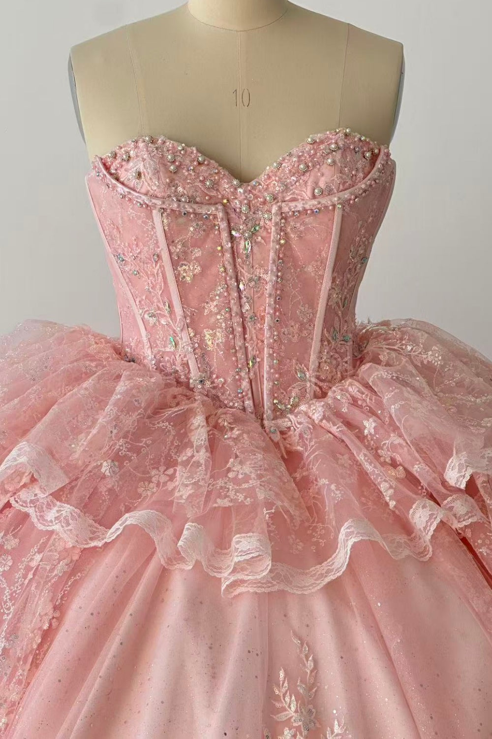 Strapless Sleeveless Ruffles Sequins Appliques Ruffles Tiered Pink Quinceañera Dress Y1027