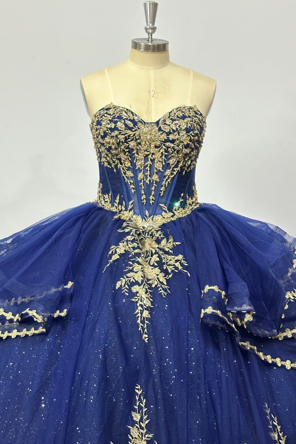Strapless Sleeveless Beaded Pleated Ruffles Tiered Gold Appliques Navy Blue Quinceañera Dress Y1033