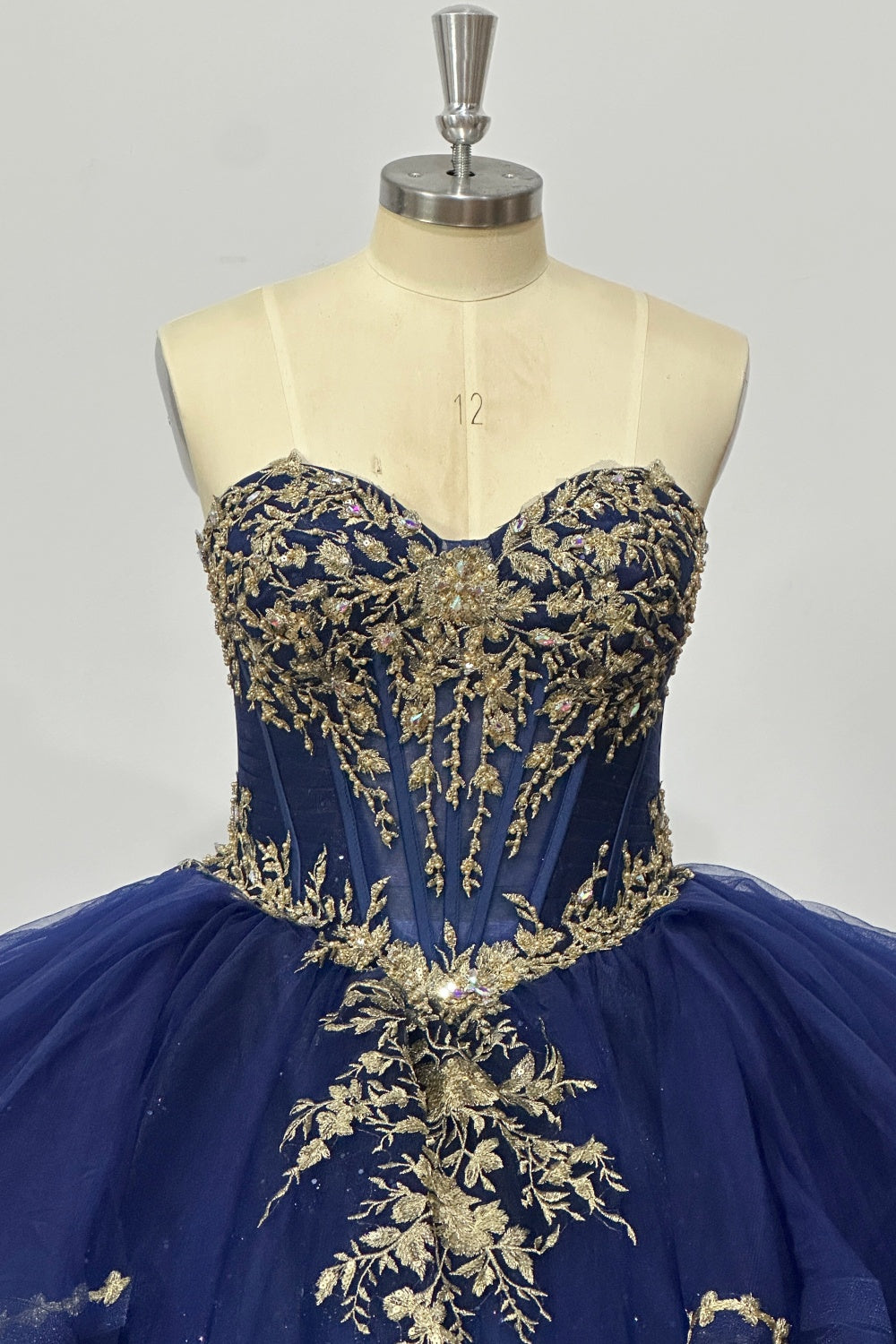 Strapless Sleeveless Beaded Pleated Ruffles Tiered Gold Appliques Navy Blue Quinceañera Dress Y1033